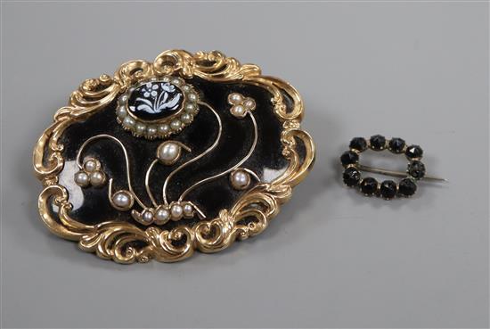 Two Victorian mourning brooches, the larger set with hardstone and split pearls.